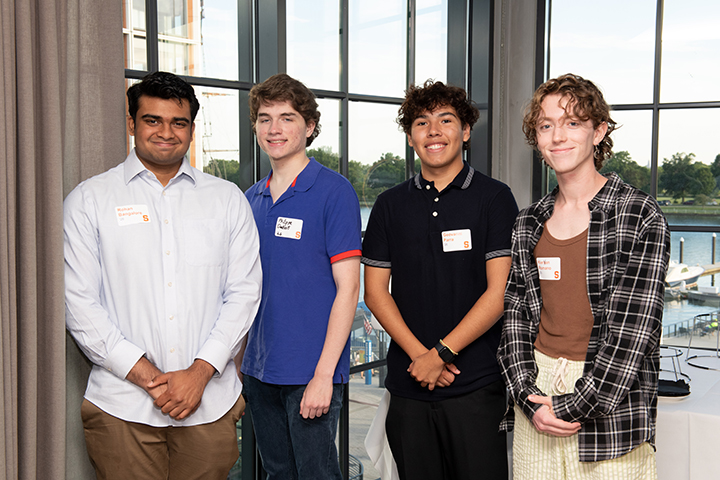 Current and incoming students socializing at the reception.